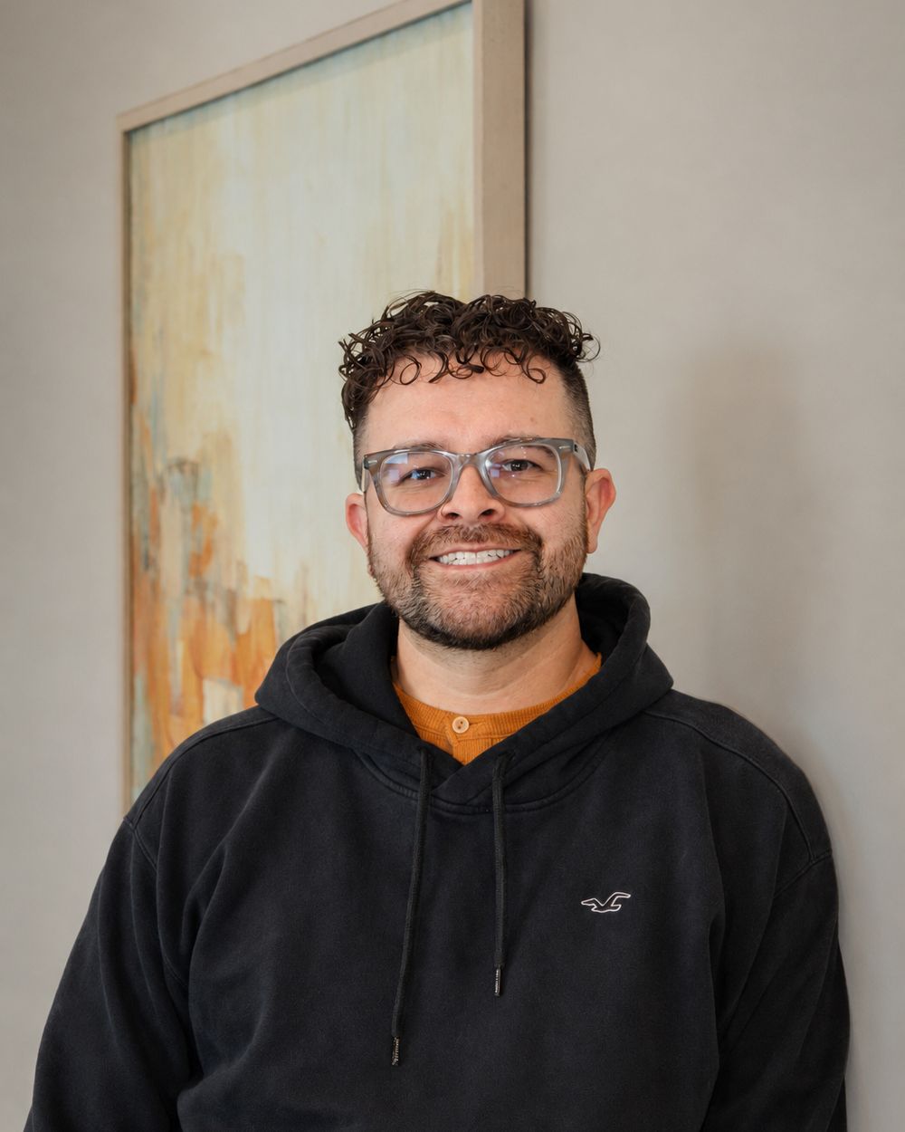 Webb team member wearing frames from the collection in the clinic.